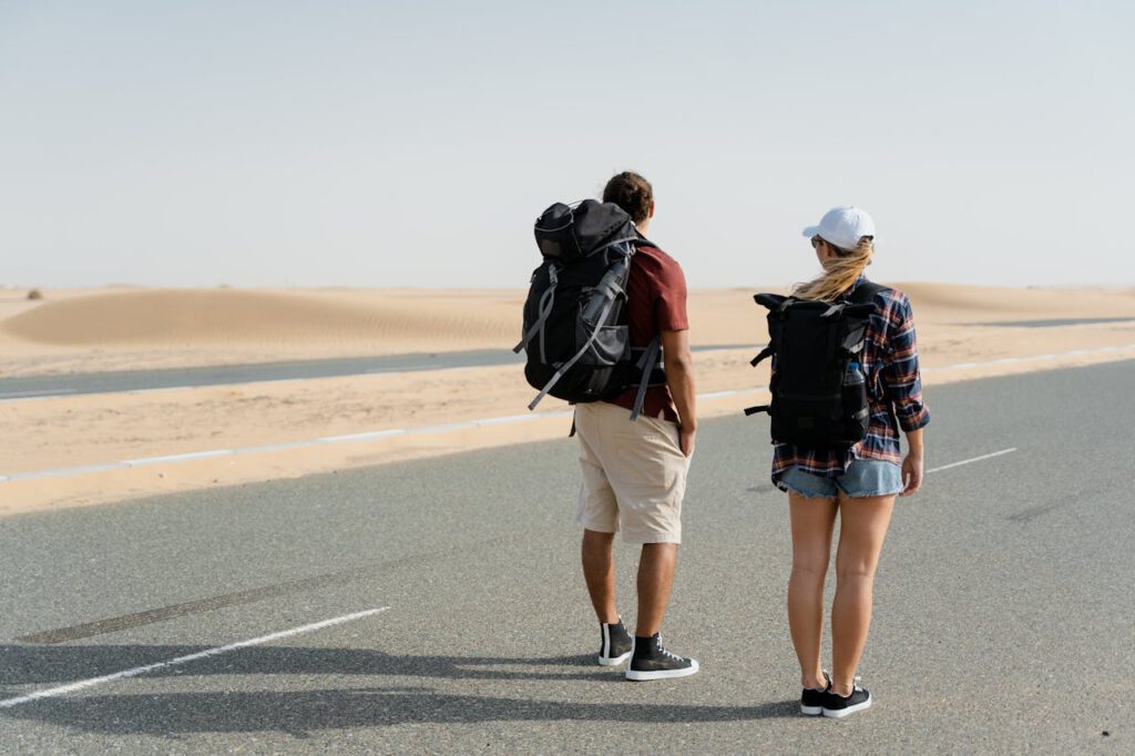 couple standing on desert road